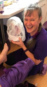 Dianne Ashcroft with a warm wax therapy slipper